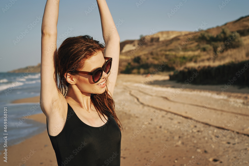 cheerful woman sunglasses posing black swimsuit island cheerful woman sunglasses posing black swimsuit island