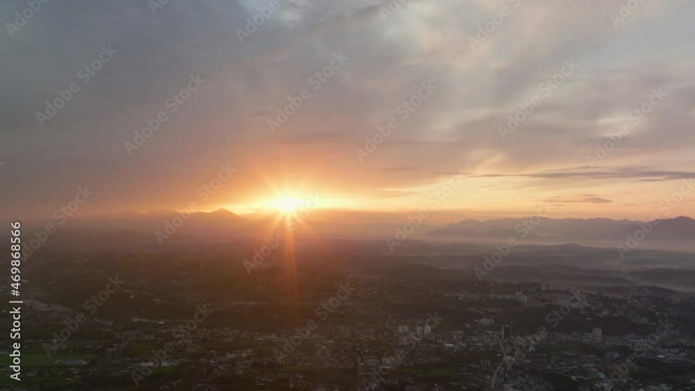 View from above, stunning aerial view of the city of Frosinone illuminated by a beautiful sunrise. Frosinone is a town and comune in Lazio, Italy. View from above, stunning aerial view of the city of Frosinone illuminated by a beautiful sunrise. Frosinone is a town and comune in Lazio, Italy.