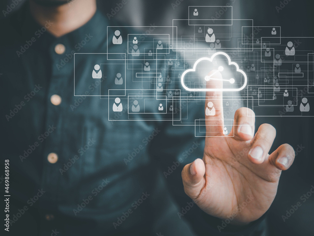 Man presses download button cloud.Cloud computing is system for sharing download and people's information big data. Man presses download button cloud.Cloud computing is system for sharing download and people's information big data.