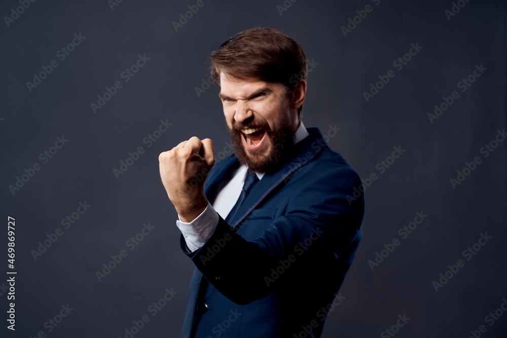bearded business man in suit emotions gesturing with hands Studio