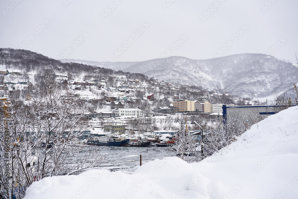 Fototapeta premium Petropavlovsk Kamchatsky city in the winter at snowy weather. Kamchatka peninsula, Russia