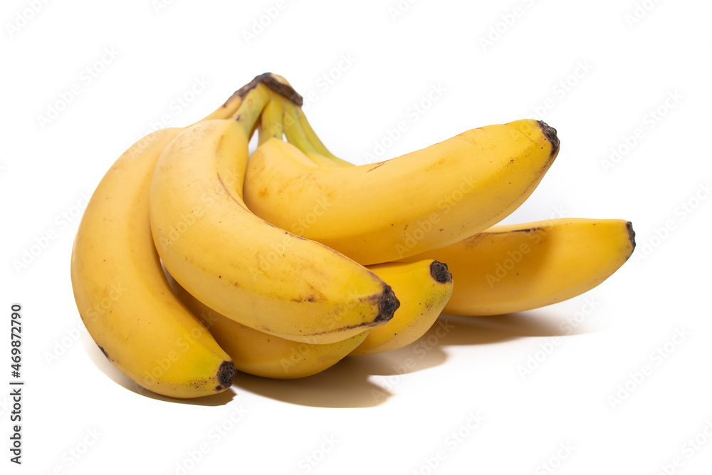 Bunch of bananas with their black spots, natural and without photoshop. Isolated on white background.