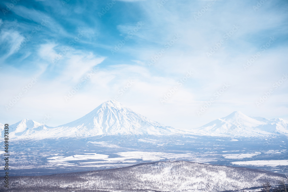 Winter landscape. Koryaksky volcano covered with snow. Kamchatka peninsula, Russia