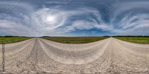 360 hdri panorama on no traffic white sand gravel road among fields with sky with some clouds and halo in equirectangular spherical projection, VR AR content. seamless