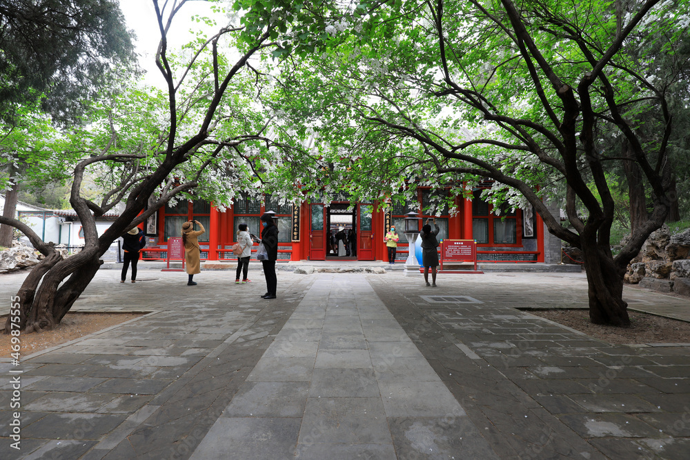 Chinese classical garden scenery and tourists