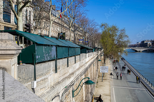 Green boxes of second-hand booksellers on the parapet of the Seine embankment