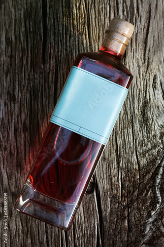 Fotografia Vermouth bottle on a wooden background