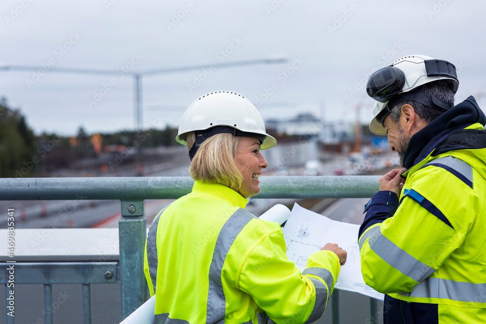 People talking on building site People talking on building site