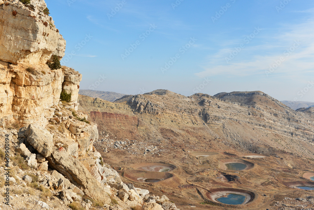Fototapeta premium Mountains view in summer season. Lakes running out of water.