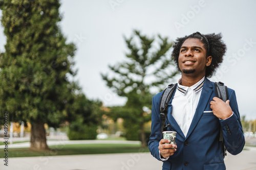 young african american businessman walking to his first job photo