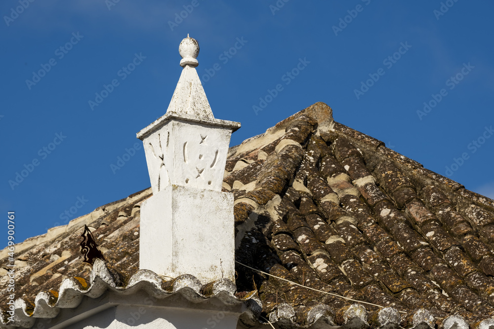 Close view of a traditional algarvian chimney on the city of Tavira, Algarve, Portugal	
