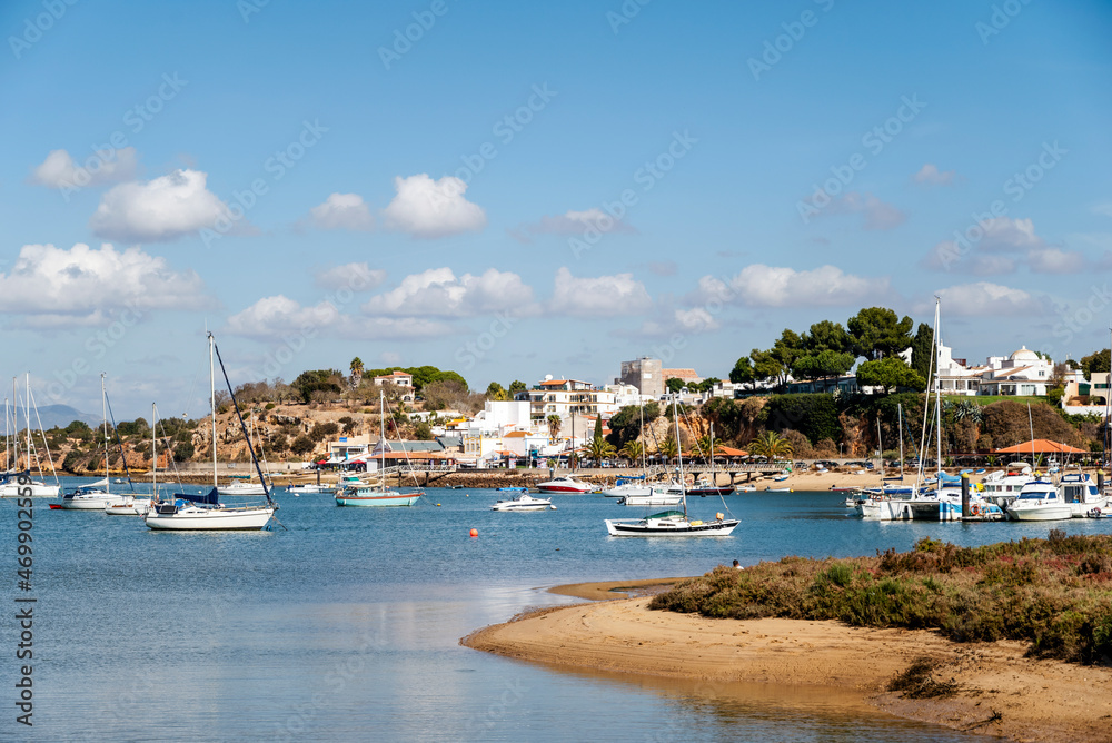 Coastal landscape with boats in Alvor, Algarve, Portugal
