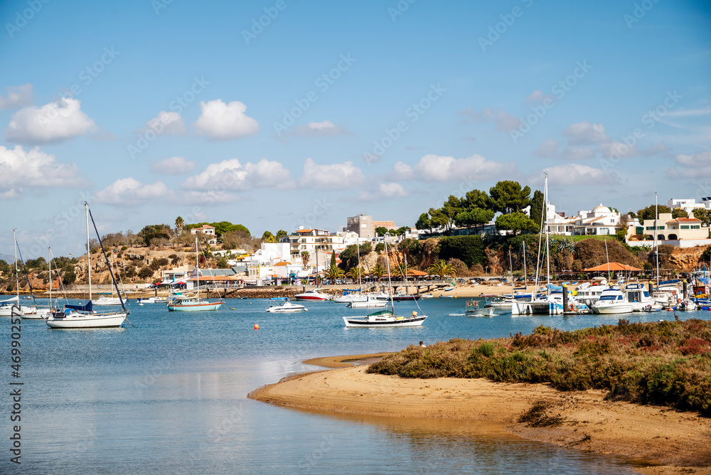 Coastal landscape with boats in Alvor, Algarve, Portugal