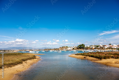 Coastal landscape with boats in Alvor, Algarve, Portugal © malajscy