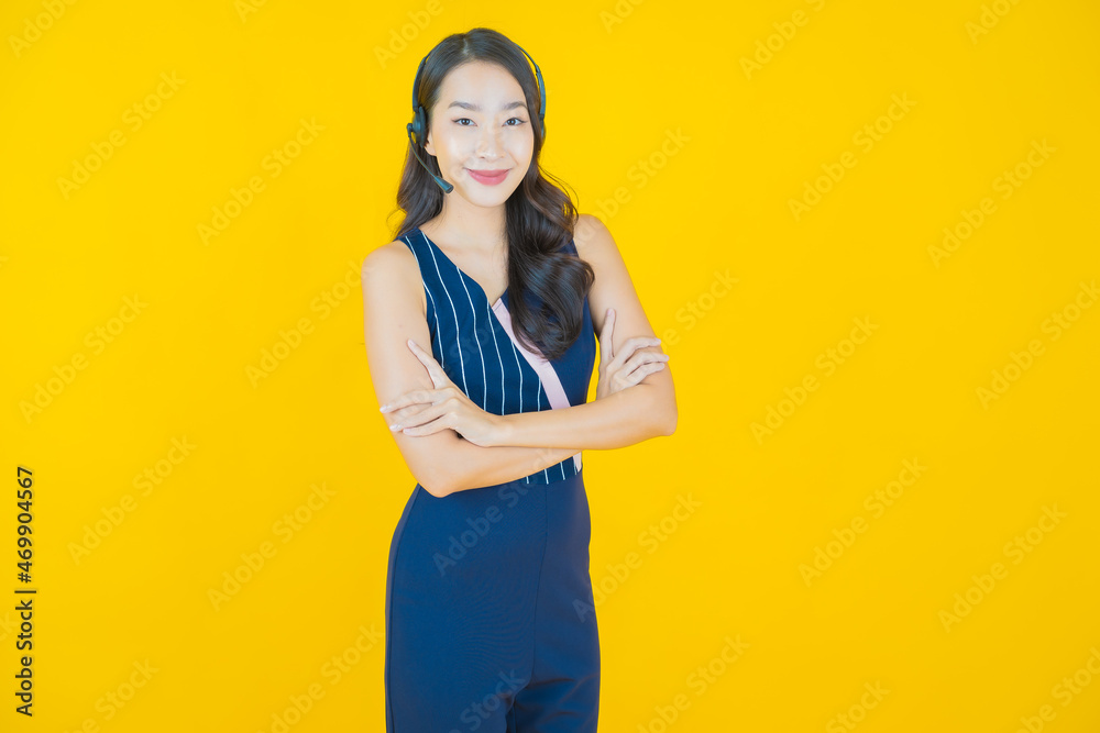 Portrait beautiful young asian woman with call center customer care service center Portrait beautiful young asian woman with call center customer care service center