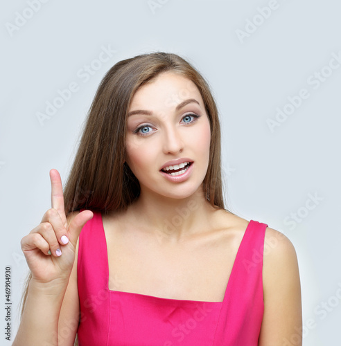 Girl pointing at camera.Portrait of pretty girl , laughing at camera