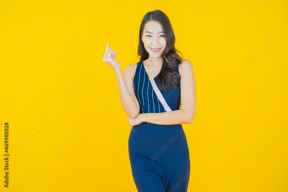 Portrait beautiful young asian woman smile with action Portrait beautiful young asian woman smile with action