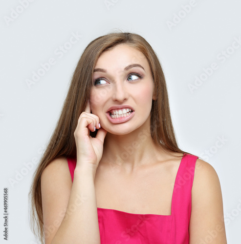 фотографія angry young woman grimacing and gesturing, girl clenching her teeth