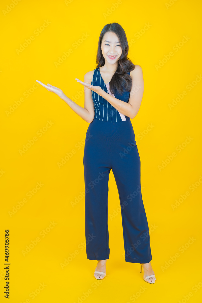 Portrait beautiful young asian woman smile with action Portrait beautiful young asian woman smile with action