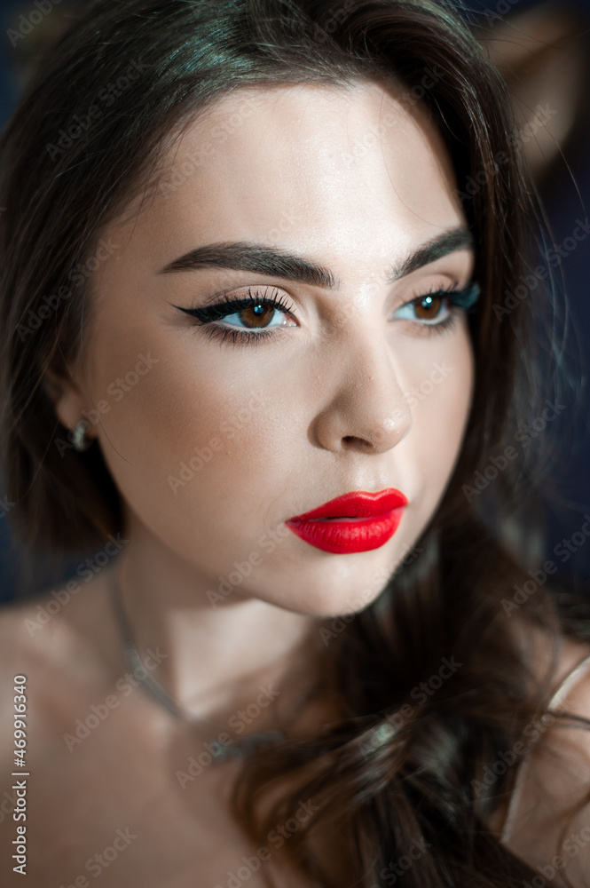 Beautiful young woman with make up and red lips Beautiful young woman with make up and red lips