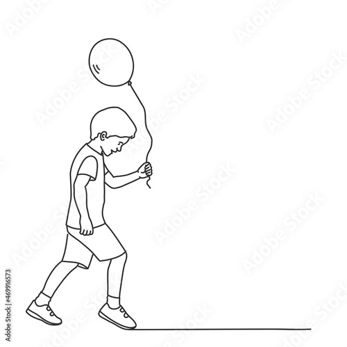 Walking boy with balloon.