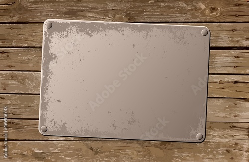 grunge plaque on wooden board
