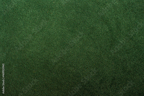 Foto The texture of the fabric is velor green. Velvet upholstery