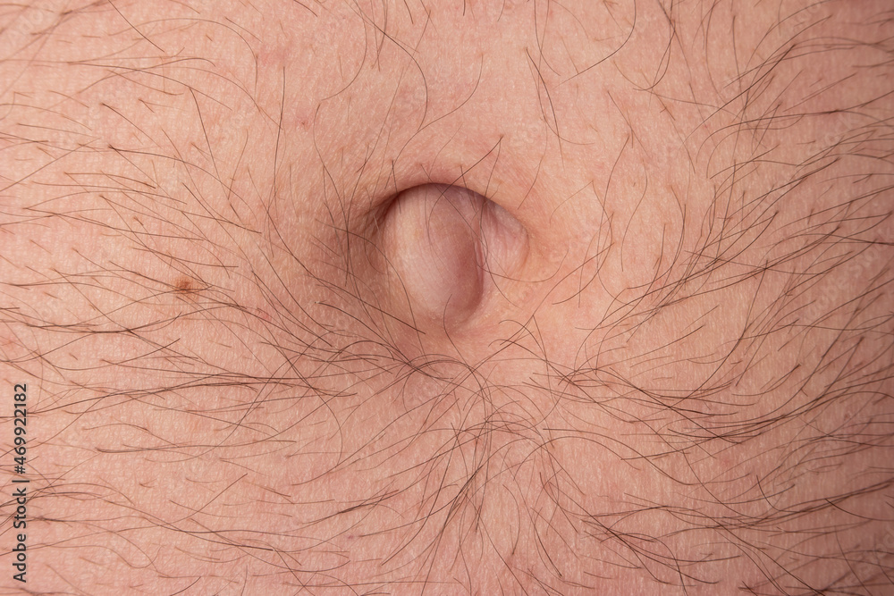 Caucasian male hairy belly and belly button. Macro close up shot, front  view Stock Photo | Adobe Stock