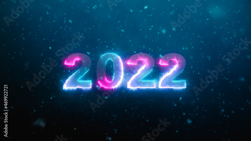 Bright coloured neon light Happy new year 2022 on dark background wuth snow effect