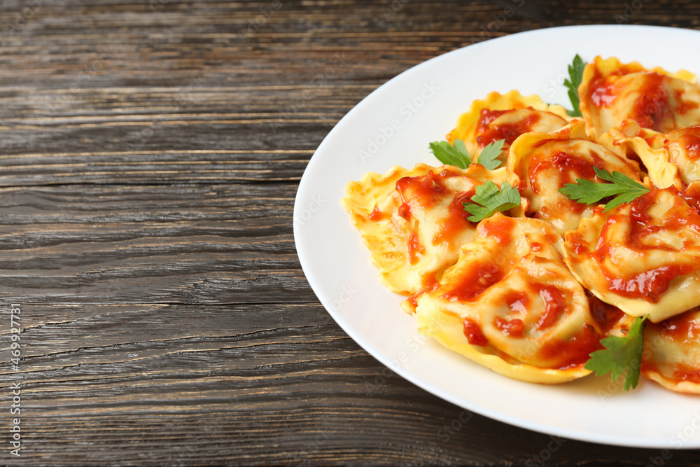 Delicious food concept with ravioli on wooden table Delicious food concept with ravioli on wooden table