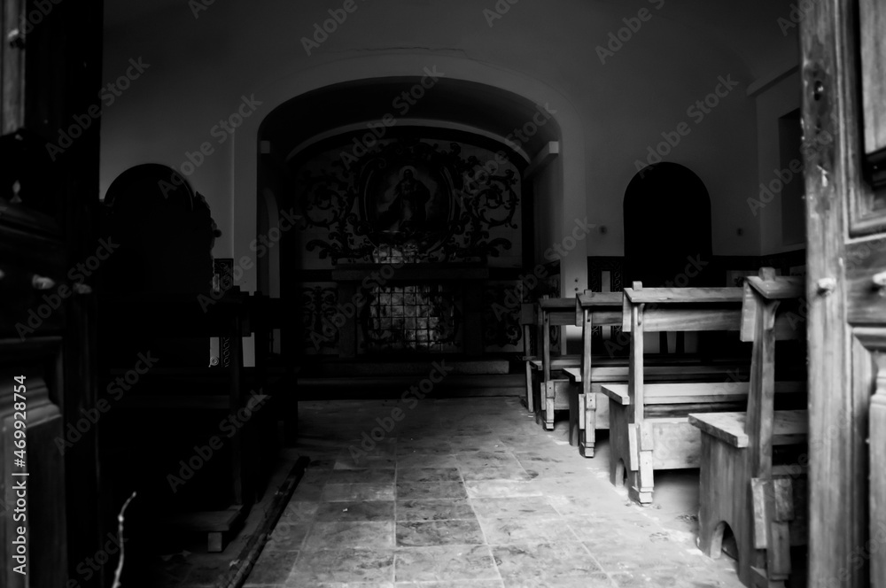 Natural light enters in an abandoned building and ruins in black and white Natural light enters in an abandoned building and ruins in black and white