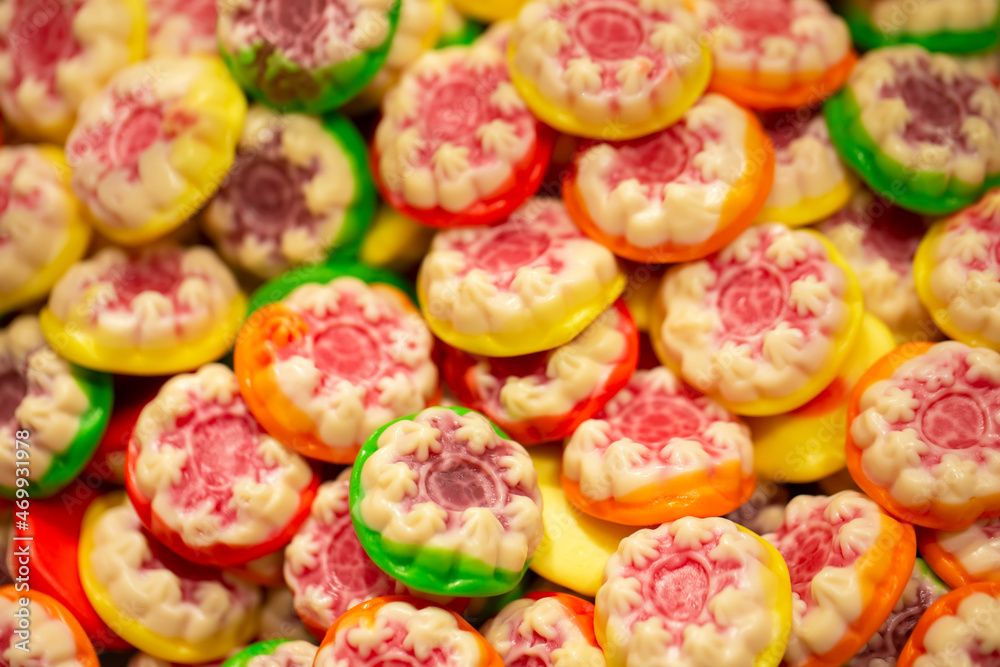 Sweets background. Bright gummy candies close-up. Close-up of colorful jujube background pattern