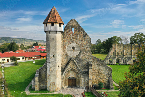 Carta, Sibiu, Romania - 2021: Aerial view over Carta Abbey Monastery during a sunny day with blue sky. Fortress historical landmark in Transylvania.