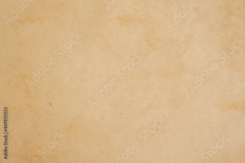 Aged texture of old vintage brown parchment paper, can be use as abstract background, wallpaper, webpage, copy space for text.