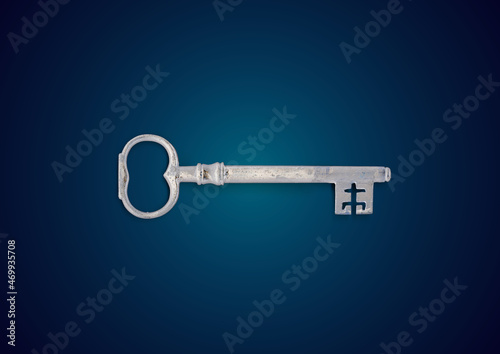 old heavy rusty key on a blue background - encrypt key for ransomware © kaptn