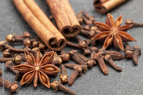 Dry cloves, Cinnamon sticks, Star anise, cloves - Traditional Christmas spices.