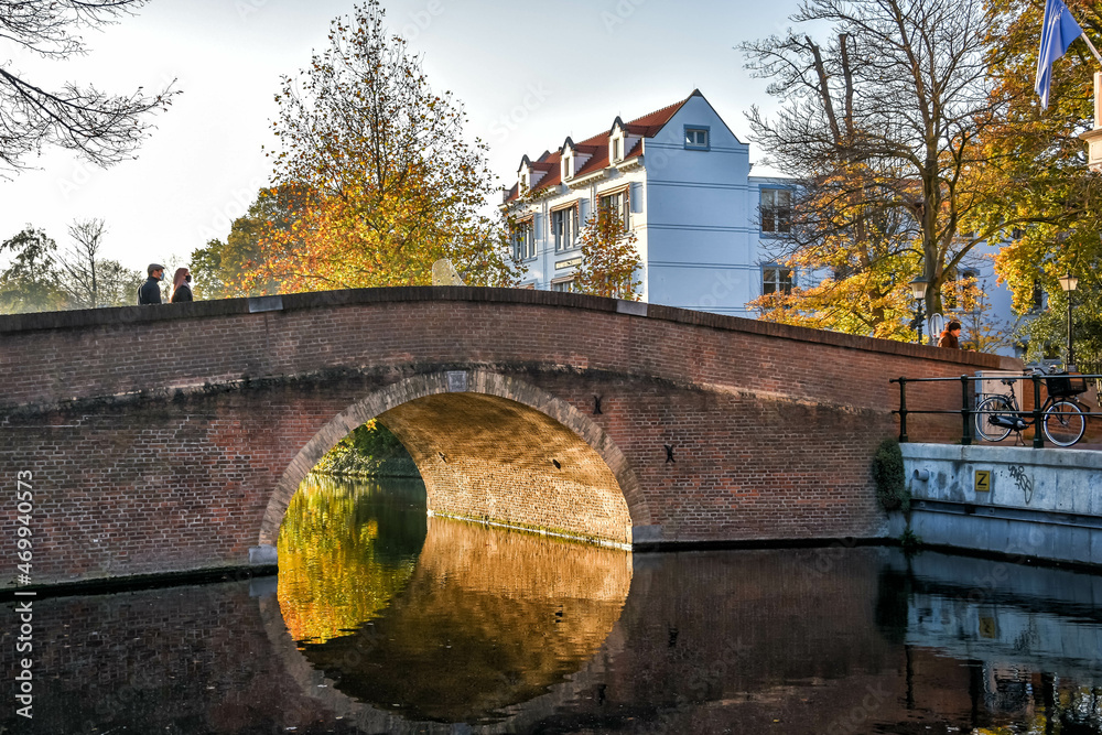 The Hague, The Netherlands. The convex bridge of the Mauritskade at the Nassaulaan in autumn. Holland, Europe The Hague, The Netherlands. The convex bridge of the Mauritskade at the Nassaulaan in autumn. Holland, Europe