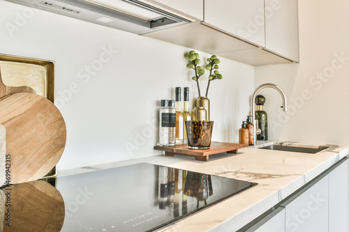 Built in cooker in marble kitchen counter photo