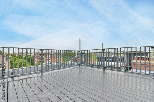 Metal fence on terrace of building photo