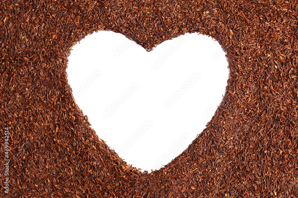 Heart shaped frame made of dry rooibos tea leaves on white background, flat lay. Space for text Heart shaped frame made of dry rooibos tea leaves on white background, flat lay. Space for text