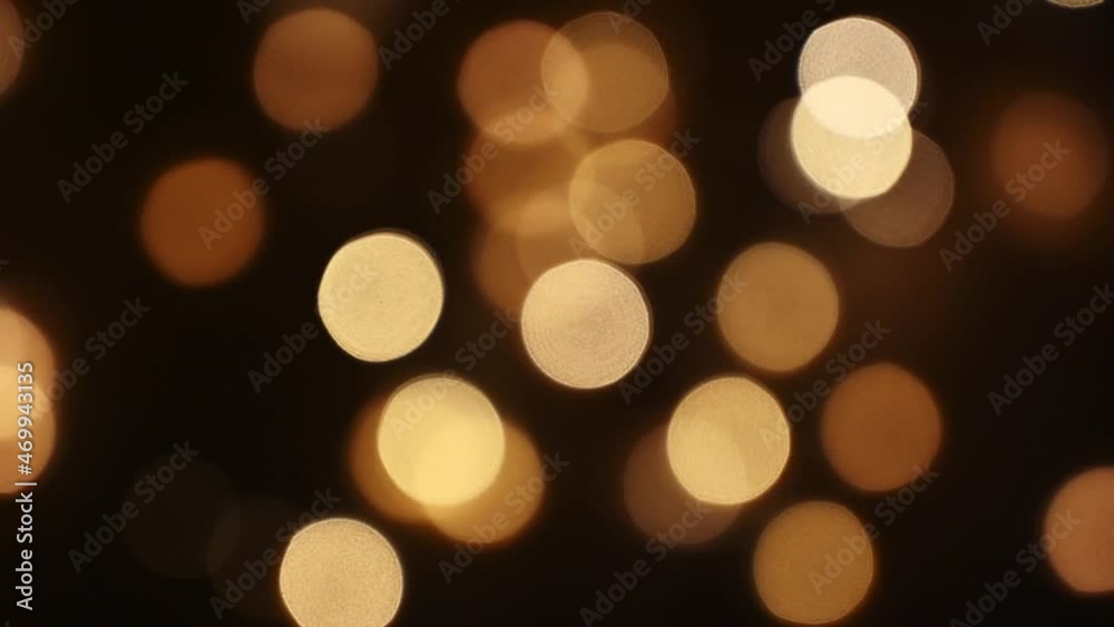 Closeup of christmas light bokeh glowing in the dark. Winter backgrounds concept Closeup of christmas light bokeh glowing in the dark. Winter backgrounds concept