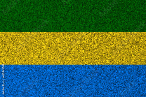 Patriotic glitter background in color of Gabon flag