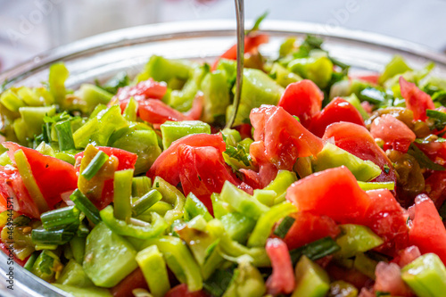 Traditional Bulgarian Salad with Tomatoes, Cucumber and Pepper.