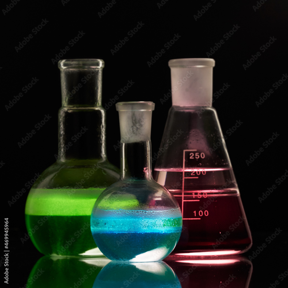 Glass flask with a chemical reagent. Glass flask with a chemical reagent.