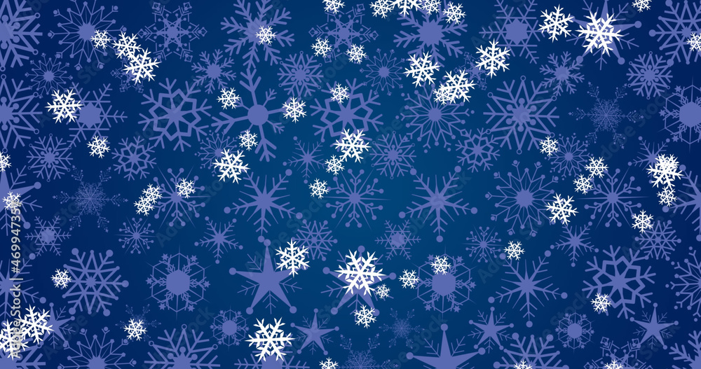 Image of snow falling at christmas on blue background