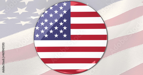 Image of american flag in circle rotating over folded stars and stripes flag