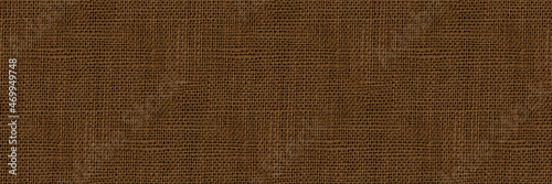 Natural canvas or jute background. Panoramic background in brown tones. 