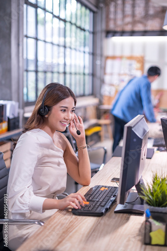 Portrait of Happy Professional executive customer call center working with smile service in the office