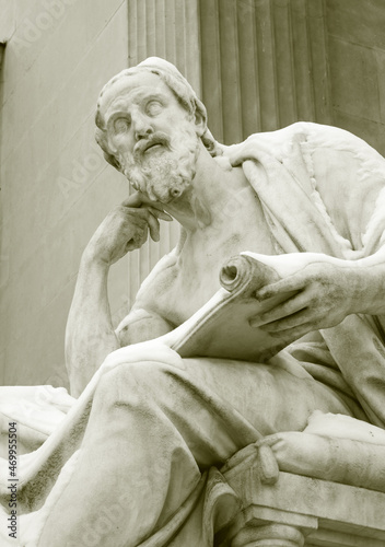 Obraz na plátně Vienna - The philosopher statue in front of the Parliament building in winter -