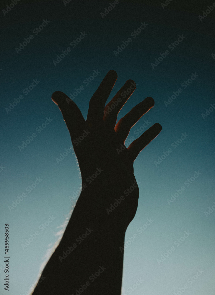 silhouette of a hand